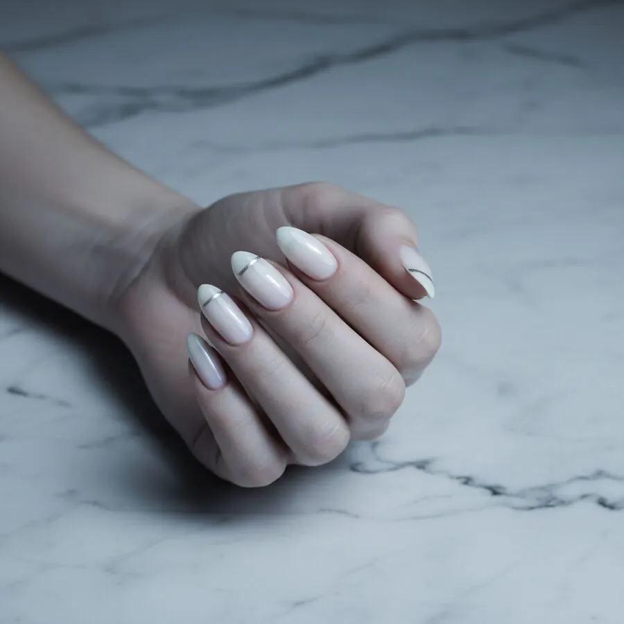 Sculpted medium-length nail extensions in soft nude tones at S Lux Nails, Santa Clara
